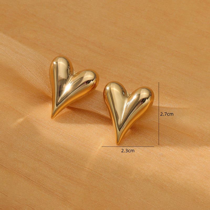 Love Heart Earrings, close-up on the ear