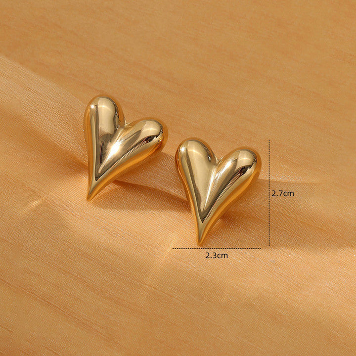 Love Heart Earrings, close-up on the ear