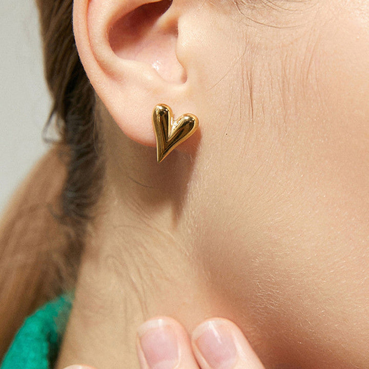 Love Heart Earrings, styled on the model