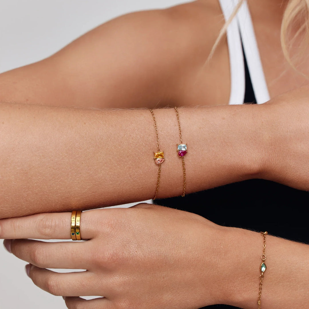 Infinite Love Birthstone Bracelet in gold, worn, side view