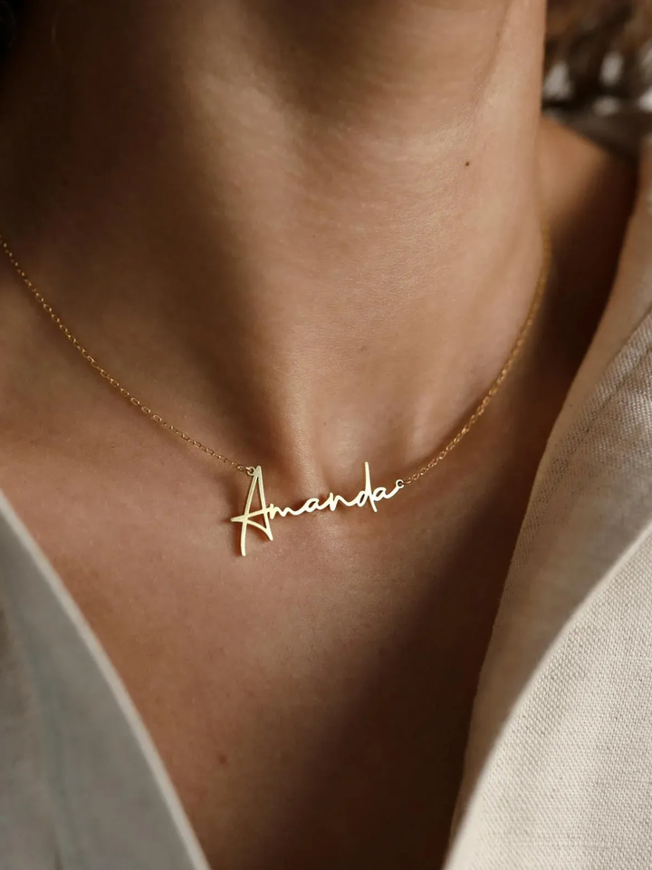 Connection Name Necklace, worn at the neckline