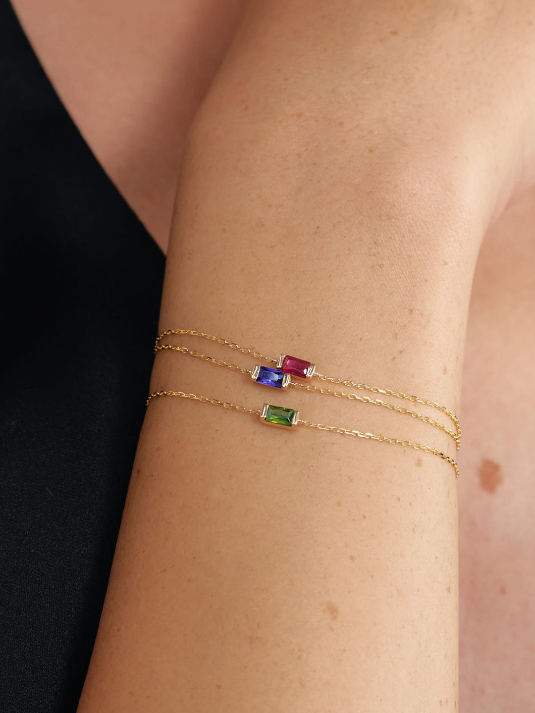 Birthstone Bracelet in gold, worn on the wrist