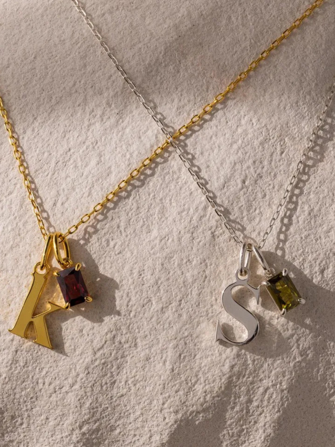Initial and Birthstone Necklace in silver, shown on the model