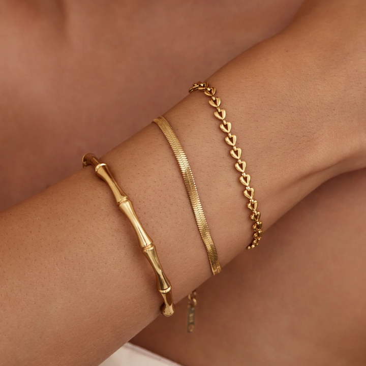 Amy Bracelet in gold, worn on the wrist