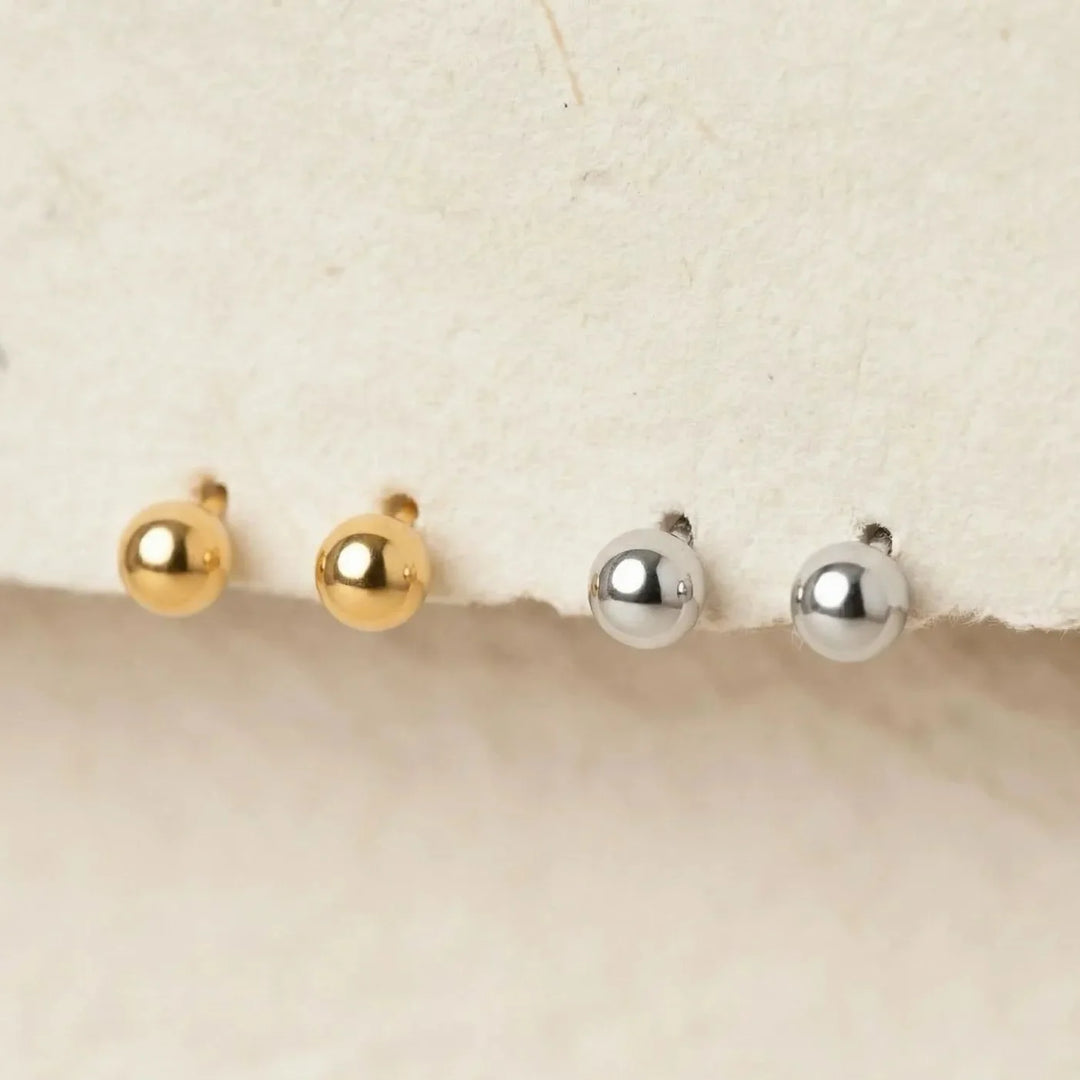 Evia Earrings, close-up on the ear