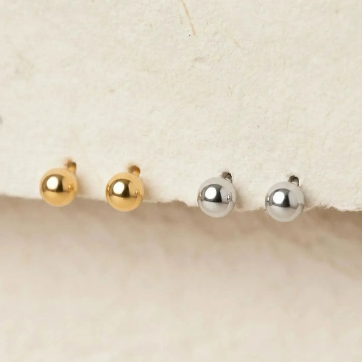 Evia Earrings, close-up on the ear
