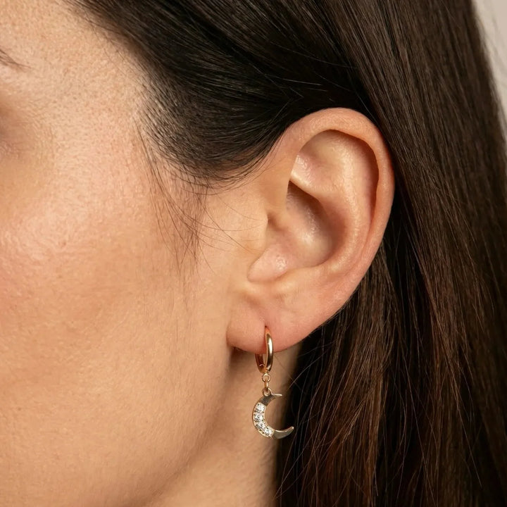 Astra Earrings, worn on the ear