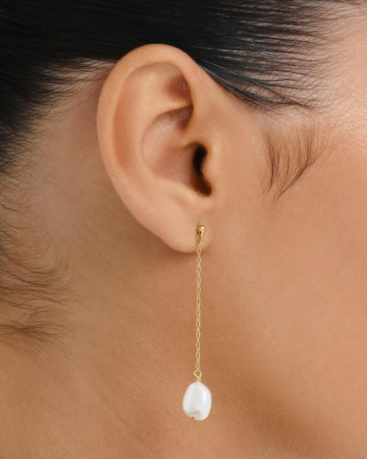 Talea Pearl Chain Earrings, worn on the ear