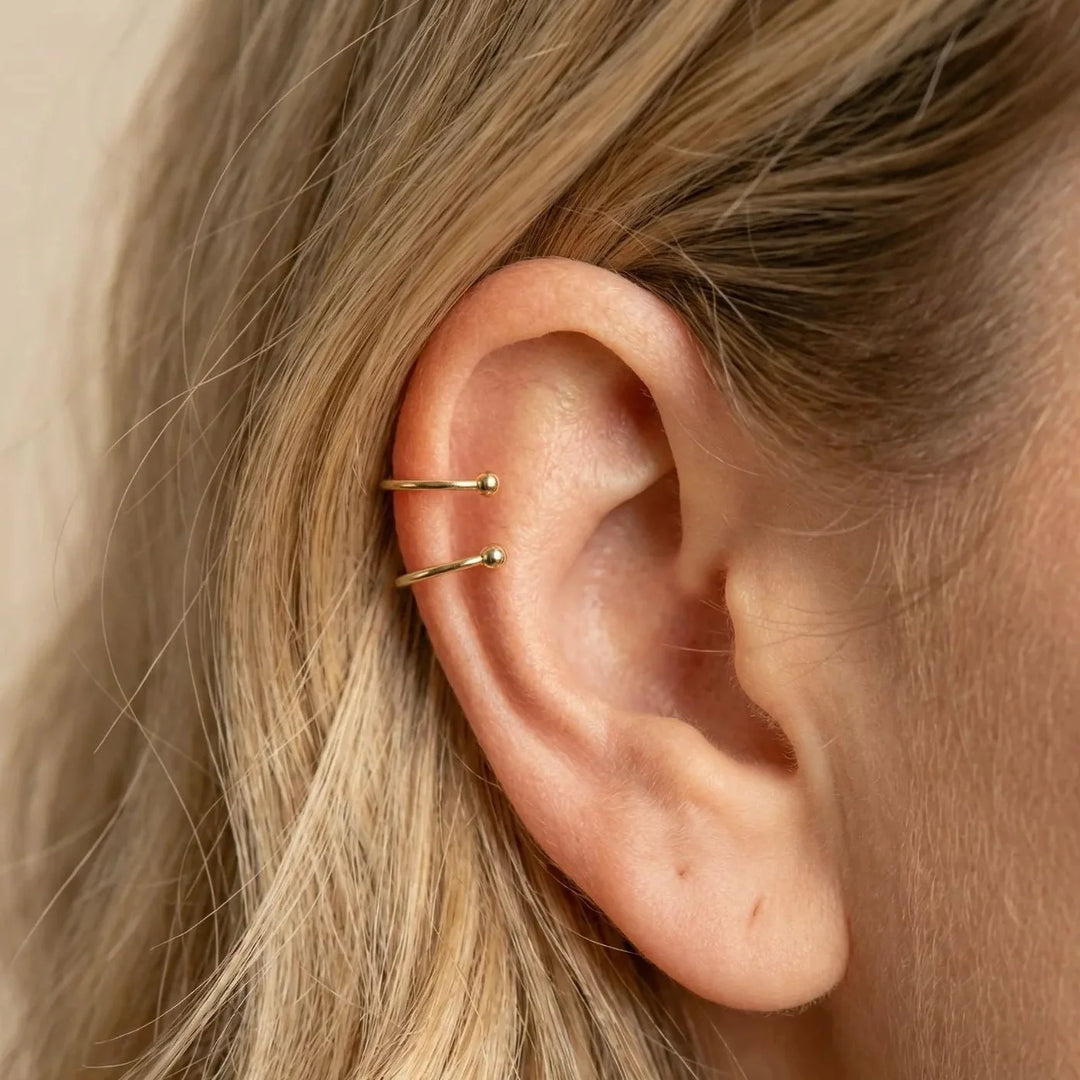 Caline Earrings, worn on the ear