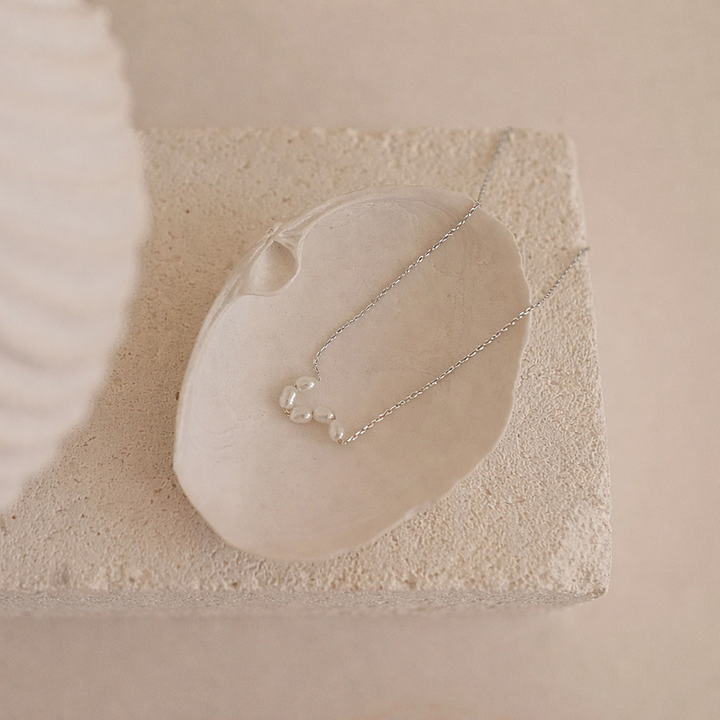 Pearl Light Necklace, worn at the neckline 2