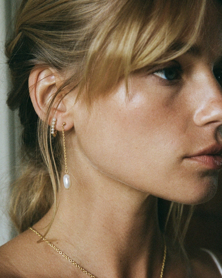 Talea Pearl Chain Earrings, shown on the model