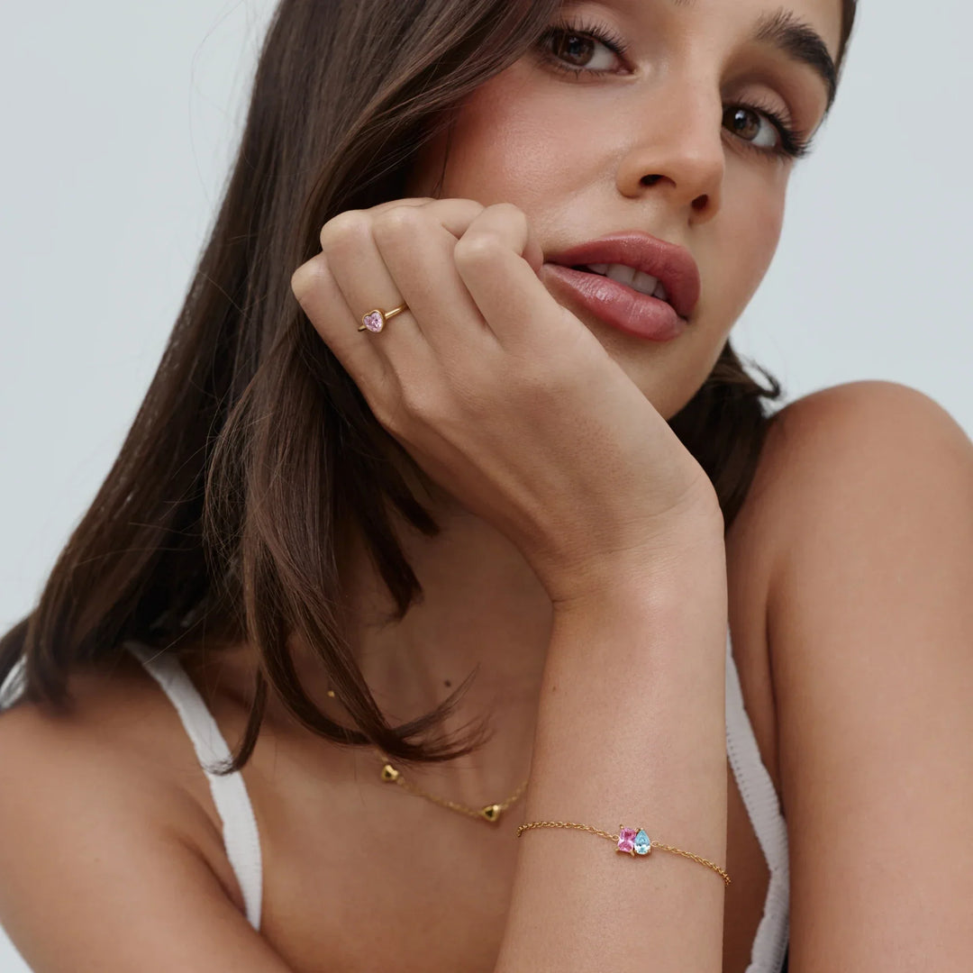 Infinite Love Birthstone Bracelet in gold, styled on the wrist