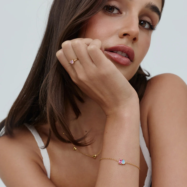 Infinite Love Birthstone Bracelet in gold, styled on the wrist
