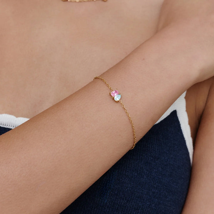 Infinite Love Birthstone Bracelet in gold, shown on the model