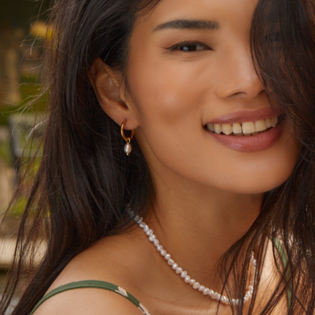 Maia Earrings, styled on the model