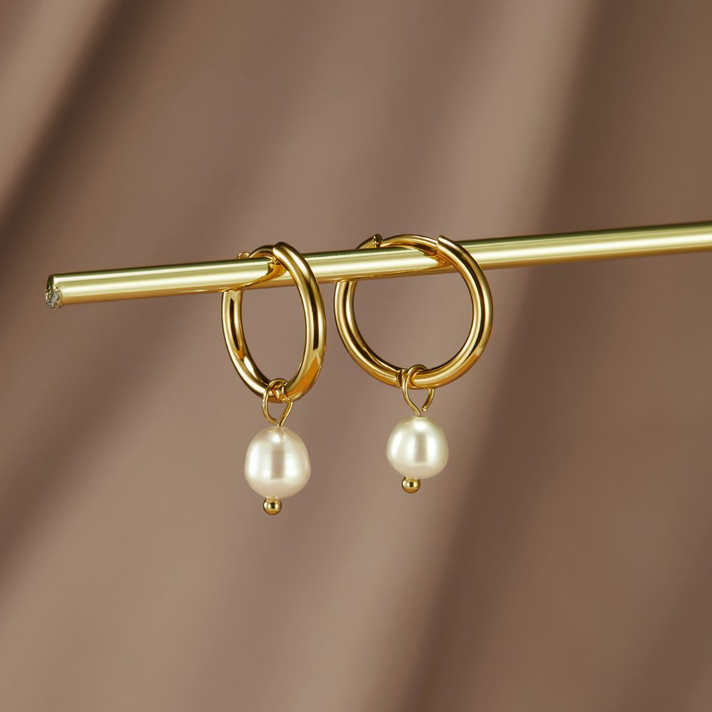 Maia Earrings, shown on the model