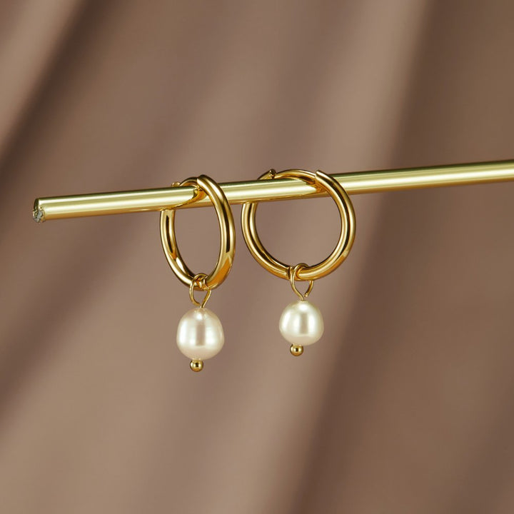 Maia Earrings, shown on the model