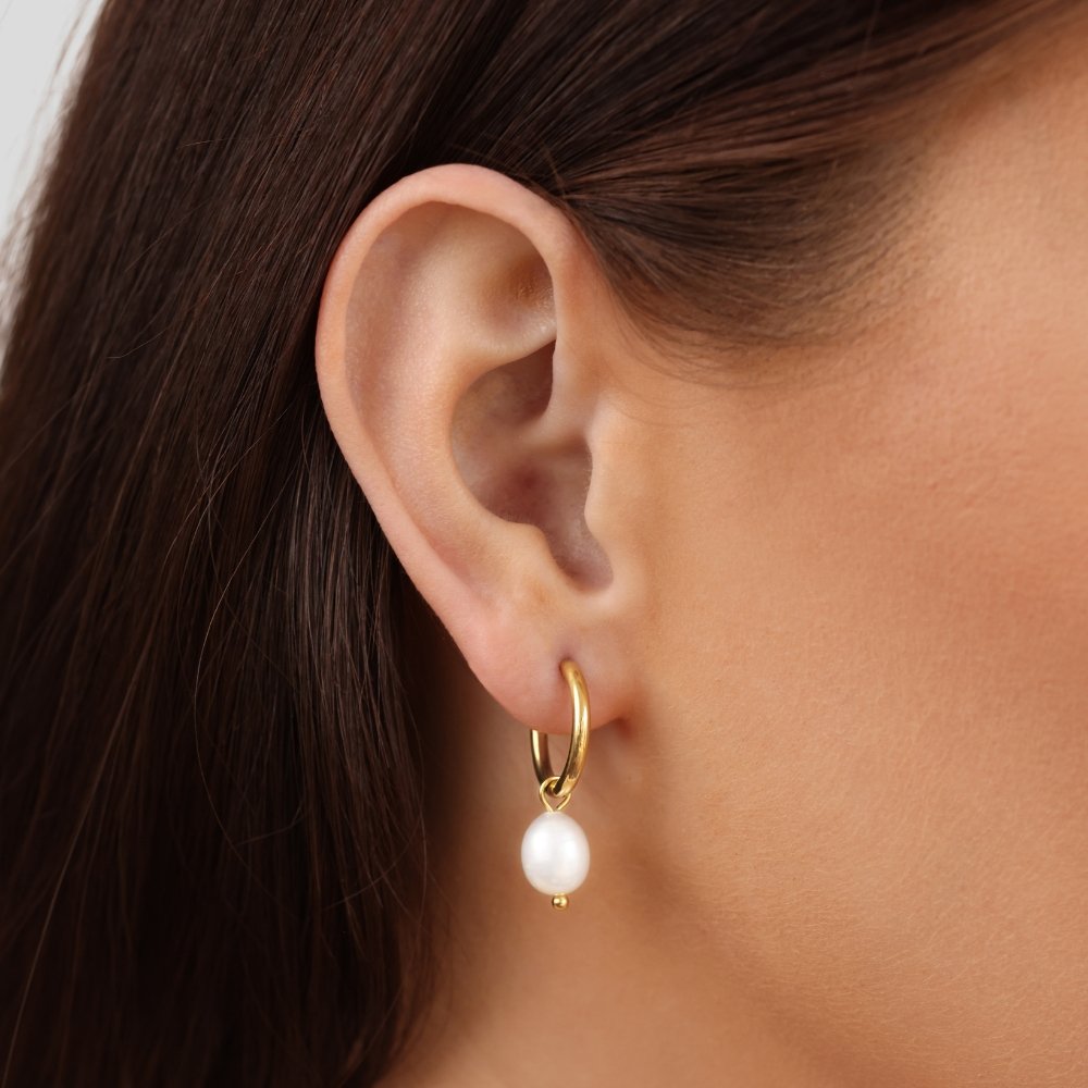 Maia Earrings, close-up on the ear