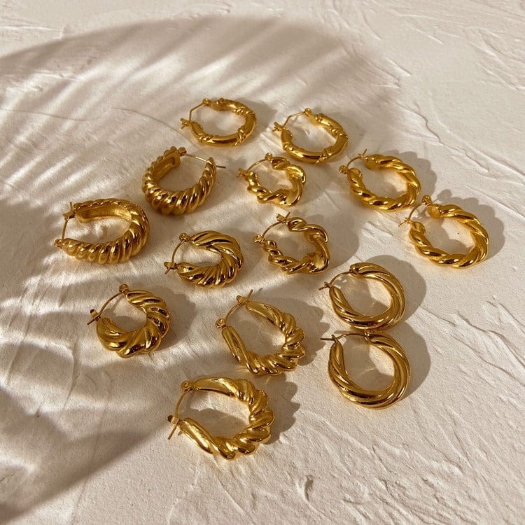 Alana Braided Earrings in gold, shown on the model 2