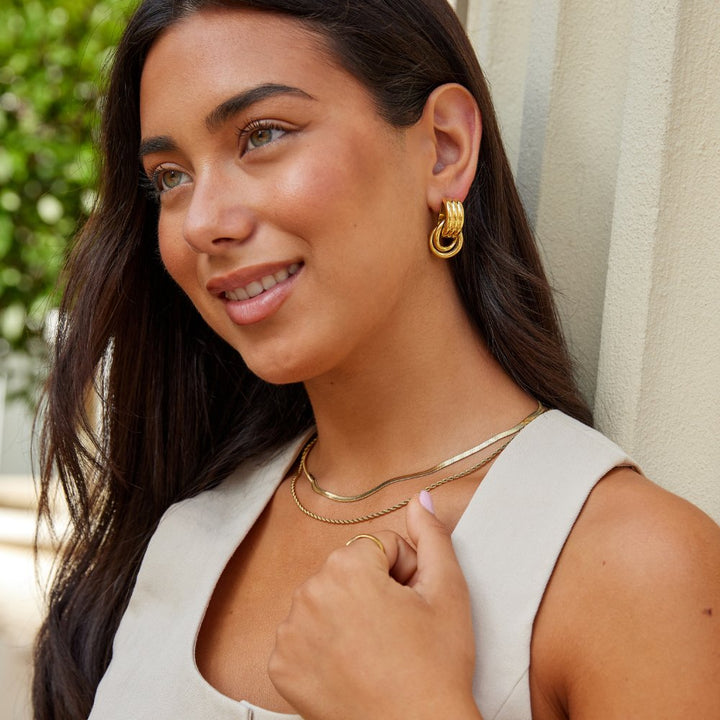 Cenya Earrings, shown on the model