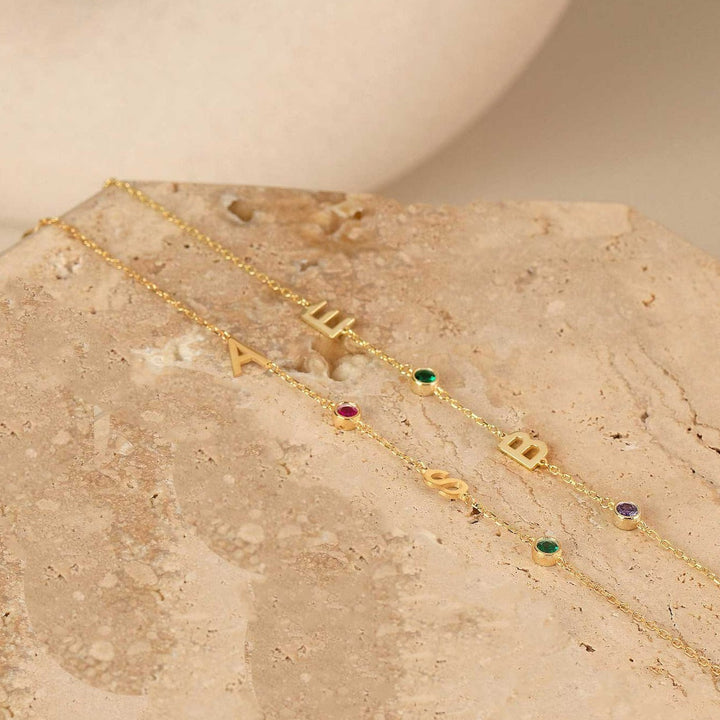 Olisa Double Initial and Birthstone Bracelet, close-up on the wrist